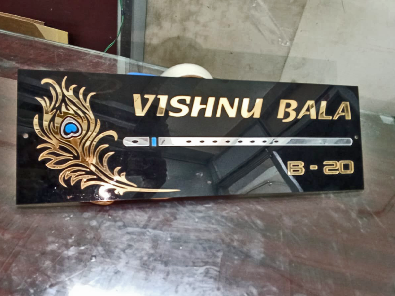 Acp with golden cutting letter in black name board